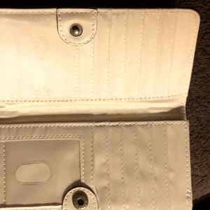 Unbranded. Very gentle preloved condition Blue and White wallet.